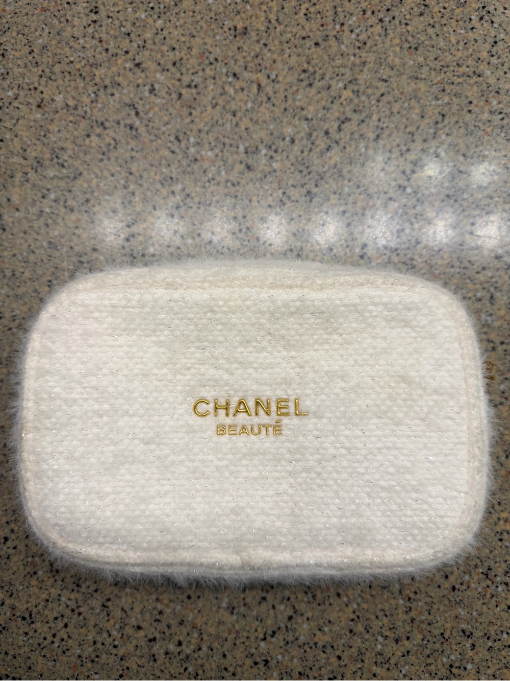CHANEL White Faux-Fur Cosmetic Case with Gold Logo